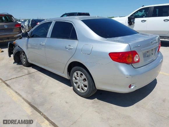 2010 Toyota Corolla with VIN JTDBU4EE7AJ083916, listed as a IAAI auction lot 41944945 with 127,406 mi miles. Bid and sale history available at carsss.com. Image 3.