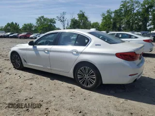 2018 BMW 5 Series 530e xDrive with VIN WBAJB1C51JG624259, listed as a Copart auction lot 57161285 with 133,463 mi miles and Clean title. Bid and sale history available at DreamBid. Image 2.