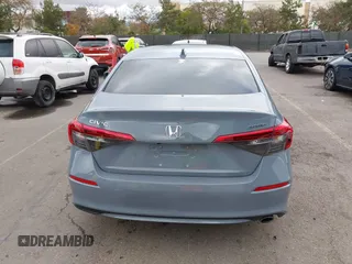 2022 Honda Civic Sport z VIN 2HGFE2F58NH569211, wystawiony jako IAAI lot #41784870 z przebiegiem 22 255 mil mil oraz . Historia ofert i sprzedaży dostępna na DreamBid. Obrazek 16.