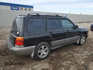 1999 Subaru Forester S with VIN JF1SF6550XH735142, listed as a Copart auction lot 85818264 with 0 mi miles and Salvage Title. Bid and sale history available at carsss.com. Image 3.