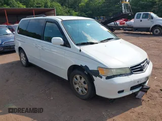2004 Honda Odyssey EX-L z VIN 5FNRL18054B064583, wystawiony jako IAAI lot #42386267 z przebiegiem 234 432 mil mil oraz . Historia ofert i sprzedaży dostępna na DreamBid. Obrazek 1.