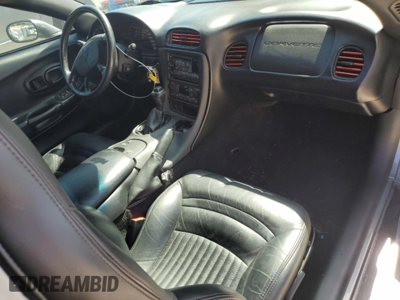 2004 Chevrolet Corvette with VIN 1G1YY32G945124387, listed as a Copart auction lot 77113234 with 59,985 mi miles and Salvage Title. Bid and sale history available at carsss.com. Image 8.