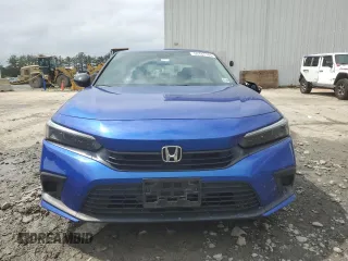 2023 Honda Civic Sport z VIN 2HGFE2F51PH545321, wystawiony jako Copart lot #56787745 z przebiegiem 25 999 mil mil oraz Szkoda całkowita • Salvage title. Historia ofert i sprzedaży dostępna na DreamBid. Obrazek 5.