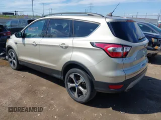 2018 Ford Escape SEL with VIN 1FMCU9HD1JUD49543, listed as a IAAI auction lot 42003218 with 122,768 mi miles. Bid and sale history available at carsss.com. Image 3.