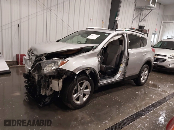 2014 Toyota RAV4 XLE with VIN JTMRFREV5ED052819, listed as a IAAI auction lot 42014672 with 235,481 mi miles and . Bid and sale history available at DreamBid. Image 2.
