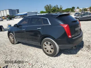 2014 Cadillac SRX Luxury Collection with VIN 3GYFNBE35ES588840, listed as a Copart auction lot 56435185 with 221,151 mi miles and Clean Title. Bid and sale history available at DreamBid. Image 2.