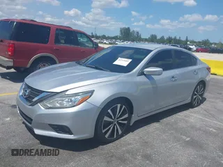 2017 Nissan Altima SV with VIN 1N4AL3AP2HC164553, listed as a IAAI auction lot 42215405 with 117,736 mi miles and . Bid and sale history available at DreamBid. Image 17.
