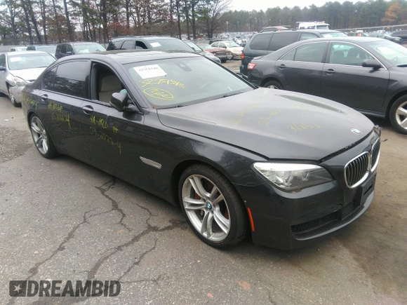 2013 BMW 7 Series 750Li xDrive with VIN WBAYF8C51DD140657, listed as a IAAI auction lot 32751348 with 128,816 mi miles. Bid and sale history available at carsss.com. Image 1.
