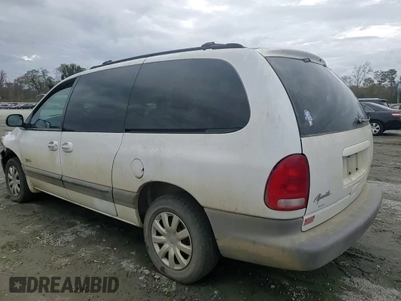 1999 Plymouth Voyager Grand SE z VIN 1P4GP44G7XB831207, wystawiony jako Copart lot #79558714 z przebiegiem 163 620 mil mil oraz Szkody całkowita. Historia ofert i sprzedaży dostępna na DreamBid. Obrazek 12.