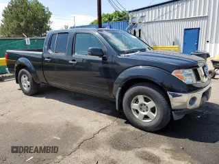 2007 Nissan Frontier SE z VIN 1N6AD09W47C447842, wystawiony jako Copart lot #62757575 z przebiegiem 113 926 mil mil oraz Czysty tytuł • Clean title. Historia ofert i sprzedaży dostępna na DreamBid. Obrazek 4.