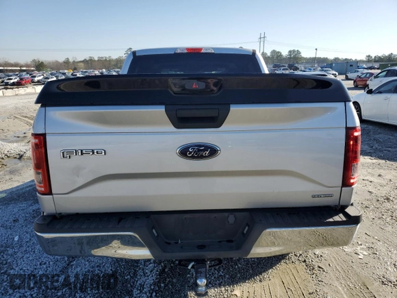 2015 Ford F-150 XLT with VIN 1FTEW1C88FKD74865, listed as a Copart auction lot 48251125 with 215,845 mi miles and Salvage Title. Bid and sale history available at carsss.com. Image 6.