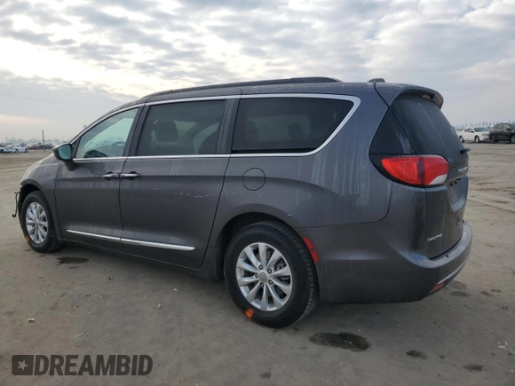 2017 Chrysler Pacifica Touring L with VIN 2C4RC1BG4HR593152, listed as a Copart auction lot 87869615 with 83,292 mi miles and Salvage Title. Bid and sale history available at DreamBid. Image 2.