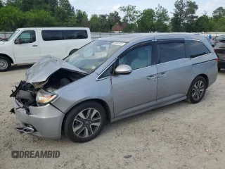 2017 Honda Odyssey Touring с VIN 5FNRL5H98HB003255, выставлен на аукционе Copart как лот 54981655 с пробегом 156 677 миль миль и Списание • Salvage title. История ставок и продаж доступна на DreamBid. Изображение 1.