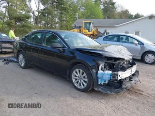 2020 Toyota Camry LE with VIN 4T1C11AK2LU393699, listed as a IAAI auction lot 42123267 with 66,932 mi miles. Bid and sale history available at carsss.com. Image 1.