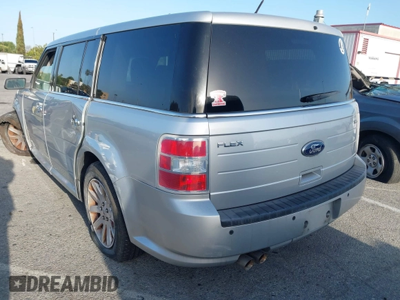 2012 Ford Flex SEL with VIN 2FMGK5CC2CBD16543, listed as a IAAI auction lot 41953622 with 124,941 mi miles. Bid and sale history available at carsss.com. Image 3.