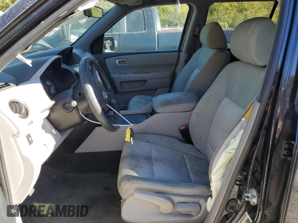 2015 Honda Pilot LX with VIN 5FNYF4H22FB019724, listed as a Copart auction lot 74787984 with 169,731 mi miles and Salvage Title. Bid and sale history available at DreamBid. Image 7.