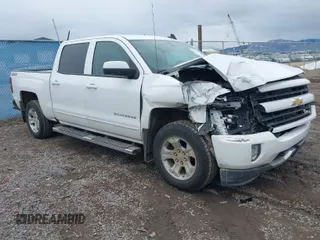 2018 Chevrolet Silverado 1500 LT with VIN 3GCUKREC0JG594914, listed as a IAAI auction lot 41735134 with 98,407 mi miles. Bid and sale history available at carsss.com. Image 1.
