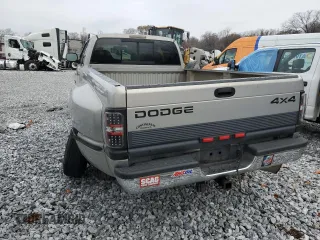 1999 Dodge Ram 3500 with VIN 1B7MF3367XJ532982, listed as a Copart auction lot 80273904 with 216,656 mi miles and Salvage Title. Bid and sale history available at carsss.com. Image 2.
