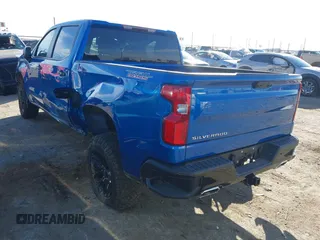 2023 Chevrolet Silverado 1500 LT Trail Boss with VIN 3GCUDFED9PG117005, listed as a IAAI auction lot 41505108 with 14,575 mi miles and . Bid and sale history available at DreamBid. Image 3.