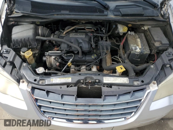 2010 Chrysler Town & Country Touring z VIN 2A4RR5D10AR273535, wystawiony jako Copart lot #54356665 z przebiegiem 238 132 mil mil oraz Szkoda całkowita • Salvage title. Historia ofert i sprzedaży dostępna na DreamBid. Obrazek 12.