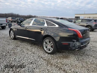 2016 Jaguar XJ Portfolio with VIN SAJWA2G71G8V95573, listed as a Copart auction lot 85975594 with 82,221 mi miles and Salvage title. Bid and sale history available at DreamBid. Image 2.