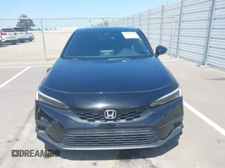 2023 Honda Civic Sport with VIN 19XFL2H84PE001354, listed as a IAAI auction lot 42053691 with 34,127 mi miles and . Bid and sale history available at DreamBid. Image 12.