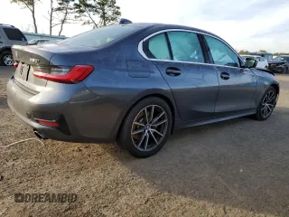 2021 BMW 3 Series 330i with VIN 3MW5R1J09M8C11559, listed as a Copart auction lot 71720262 with 36,950 mi miles. Bid and sale history available at carsss.com. Image 3.