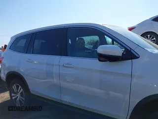 2016 Honda Pilot EX-L with VIN 5FNYF6H5XGB066295, listed as a IAAI auction lot 42063630 with 156,734 mi miles. Bid and sale history available at carsss.com. Image 14.