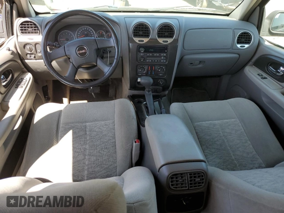 2005 GMC Envoy SLE with VIN 1GKDS13S452173325, listed as a Copart auction lot 61304205 with 155,501 mi miles and Clean title. Bid and sale history available at DreamBid. Image 8.