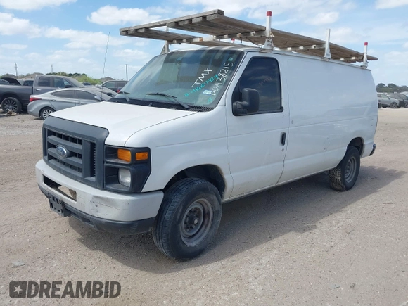 2013 Ford Econoline Cargo Commercial with VIN 1FTSE3EL4DDA38215, listed as a IAAI auction lot 41627924 with 181,821 mi miles. Bid and sale history available at carsss.com. Image 2.