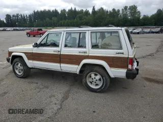 1990 Jeep Grand Wagoneer z VIN 1J4FN78L0LL282169, wystawiony jako Copart lot #59809545 z przebiegiem 194 382 mil mil oraz Czysty tytuł • Clean title. Historia ofert i sprzedaży dostępna na DreamBid. Obrazek 2.
