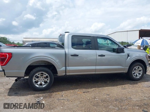 2023 Ford F-150 XL with VIN 1FTEW1C84PKD69454, listed as a IAAI auction lot 42087856 with 53,164 mi miles. Bid and sale history available at carsss.com. Image 13.