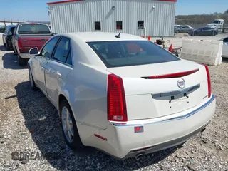2008 Cadillac CTS AWD with VIN 1G6DG577X80139631, listed as a IAAI auction lot 41813311 with 208,723 mi miles and . Bid and sale history available at carsss.com. Image 3.