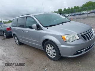 2014 Chrysler Town & Country Touring z VIN 2C4RC1BG0ER247062, wystawiony jako IAAI lot #42176433 z przebiegiem 200 089 mil mil oraz . Historia ofert i sprzedaży dostępna na DreamBid. Obrazek 1.