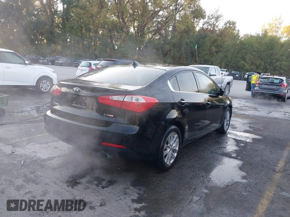 2014 Kia Forte EX with VIN KNAFX4A8XE5121630, listed as a IAAI auction lot 40517819 with 144,087 mi miles. Bid and sale history available at carsss.com. Image 4.