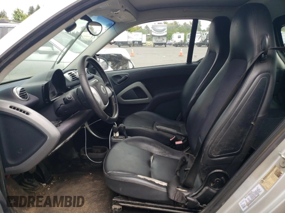 2012 Smart fortwo Pure с VIN WMEEJ3BA1CK573090, выставлен на аукционе Copart как лот 59881025 с пробегом 128 086 миль миль и Чистый • Clean title. История ставок и продаж доступна на DreamBid. Изображение 7.