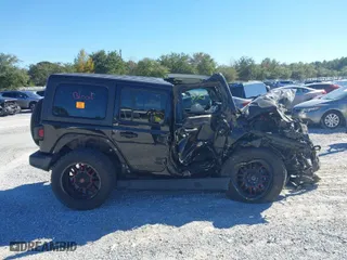 2019 Jeep Wrangler Unlimited Sahara with VIN 1C4HJXEG0KW604937, listed as a IAAI auction lot 40931379 with 94,821 mi miles. Bid and sale history available at carsss.com. Image 13.