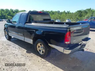 2001 Ford F-150 XL z VIN 1FTRX17WX1NB86721, wystawiony jako IAAI lot #42319610 z przebiegiem 254 826 mil mil oraz . Historia ofert i sprzedaży dostępna na DreamBid. Obrazek 3.