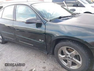 2002 Pontiac Bonneville SLE z VIN 1G2HY54K324126583, wystawiony jako IAAI lot #41939075 z przebiegiem 178 591 mil mil oraz . Historia ofert i sprzedaży dostępna na DreamBid. Obrazek 6.
