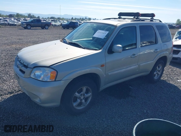2005 Mazda Tribute S with VIN 4F2CZ96105KM04032, listed as a IAAI auction lot 42157429 with 199,704 mi miles and . Bid and sale history available at carsss.com. Image 2.