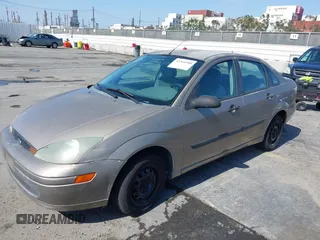 2004 Ford Focus z VIN 1FAFP33Z24W149701, wystawiony jako IAAI lot #42360188 z przebiegiem 152 415 mil mil oraz . Historia ofert i sprzedaży dostępna na DreamBid. Obrazek 2.