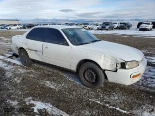 1995 Toyota Camry LE with VIN 4T1GK12E5SU858787, listed as a Copart auction lot 89400945 with 184,167 mi miles and Clean Title. Bid and sale history available at carsss.com. Image 4.