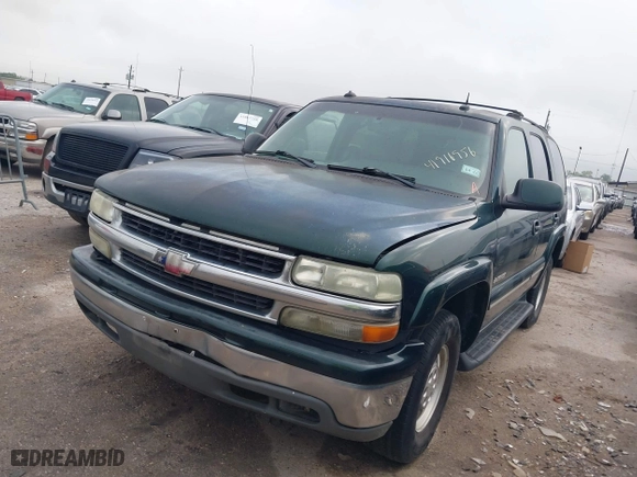 2003 Chevrolet Tahoe LT with VIN 1GNEC13Z03R268258, listed as a IAAI auction lot 41916956 with 218,720 mi miles. Bid and sale history available at carsss.com. Image 2.