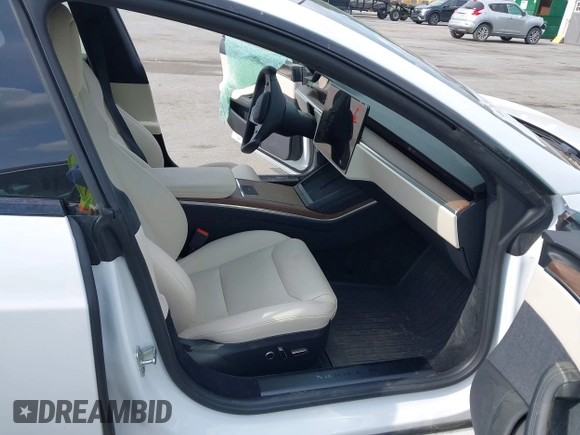 2022 Tesla Model S with VIN 5YJSA1E57NF462175, listed as a IAAI auction lot 42231439 with Not provided miles and . Bid and sale history available at DreamBid. Image 5.