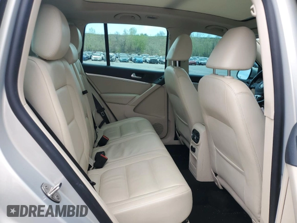 2013 Volkswagen Tiguan SE с VIN WVGBV7AXXDW548780, выставлен на аукционе Copart как лот 55157985 с пробегом 92 767 миль миль и Списание • Salvage title. История ставок и продаж доступна на DreamBid. Изображение 11.