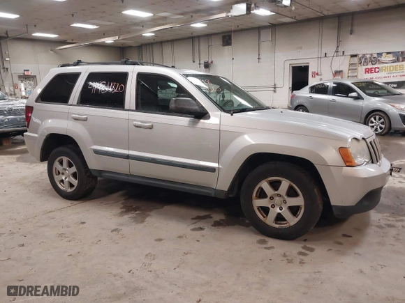 2009 Jeep Grand Cherokee Laredo with VIN 1J8GR48K89C553694, listed as a IAAI auction lot 41984820 with 196,266 mi miles. Bid and sale history available at carsss.com. Image 14.