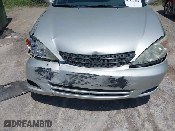 2002 Toyota Camry LE z VIN 4T1BE32K02U630523, wystawiony jako IAAI lot #42330724 z przebiegiem 138 459 mil mil oraz . Historia ofert i sprzedaży dostępna na DreamBid. Obrazek 6.