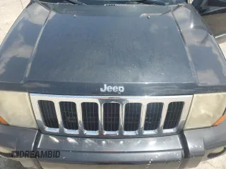 2008 Jeep Commander Sport z VIN 1J8HH48K58C126172, wystawiony jako Copart lot #61961285 z przebiegiem 235 022 mil mil oraz Szkoda całkowita • Salvage title. Historia ofert i sprzedaży dostępna na DreamBid. Obrazek 11.