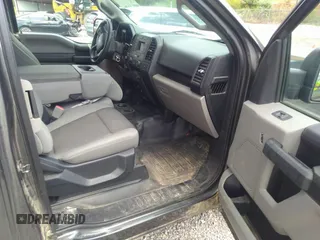 2020 Ford F-150 XL with VIN 1FTFX1E58LFB70690, listed as a IAAI auction lot 42131900 with 168,571 mi miles and . Bid and sale history available at DreamBid. Image 5.