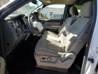 2010 Ford F-150 XL with VIN 1FTEW1C80AFA70138, listed as a Copart auction lot 53135735 with 209,803 mi miles and Salvage Title. Bid and sale history available at carsss.com. Image 7.